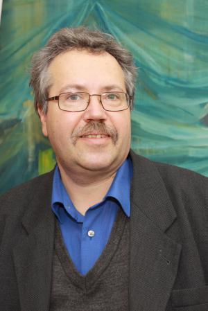 Prof. dr hab. Marek Biesiada z Zakładu Astrofizyki i Kosmologii UŚ